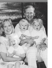 Jack Evans, wife, and triplets