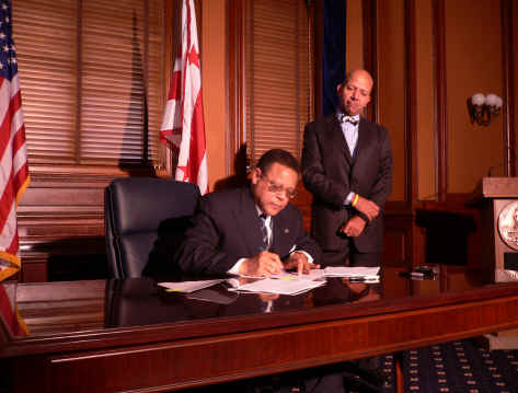 Swygert, Williams, NCMC signing, January 5, 2006